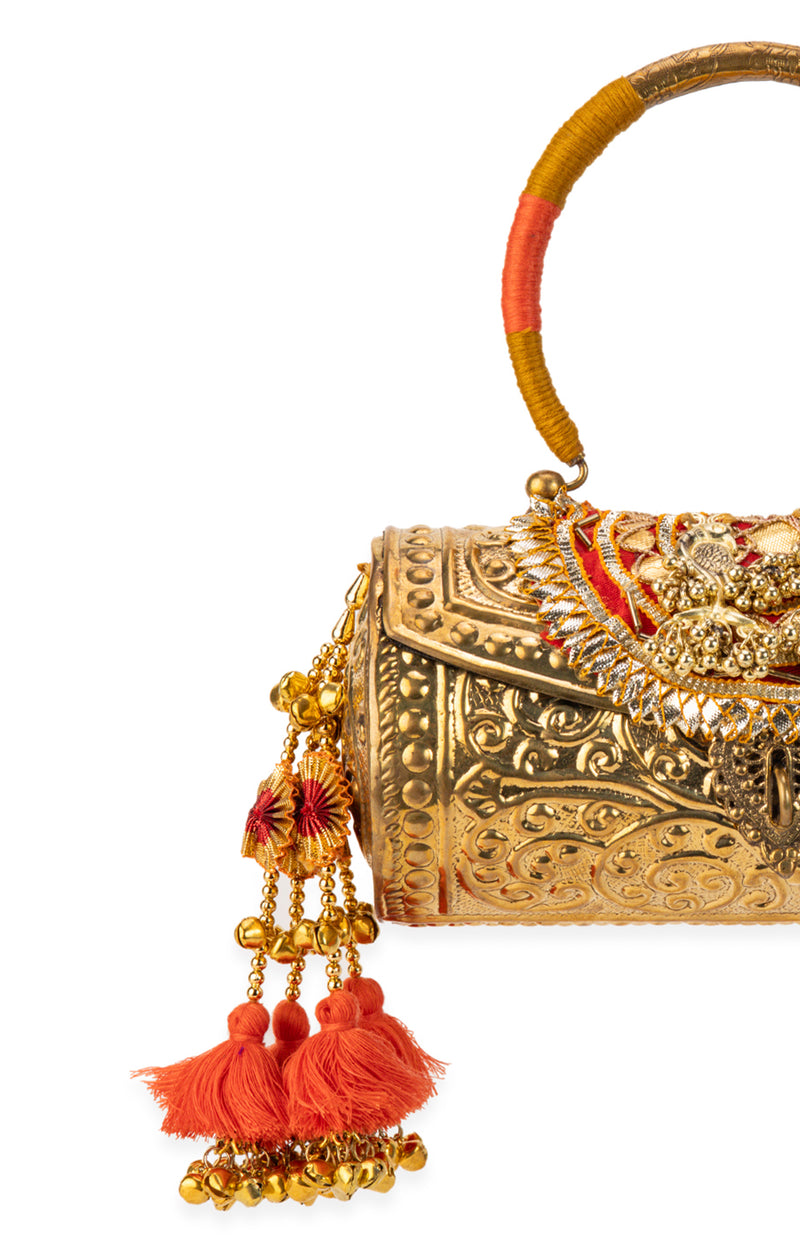 Tanvika Gold Handbag