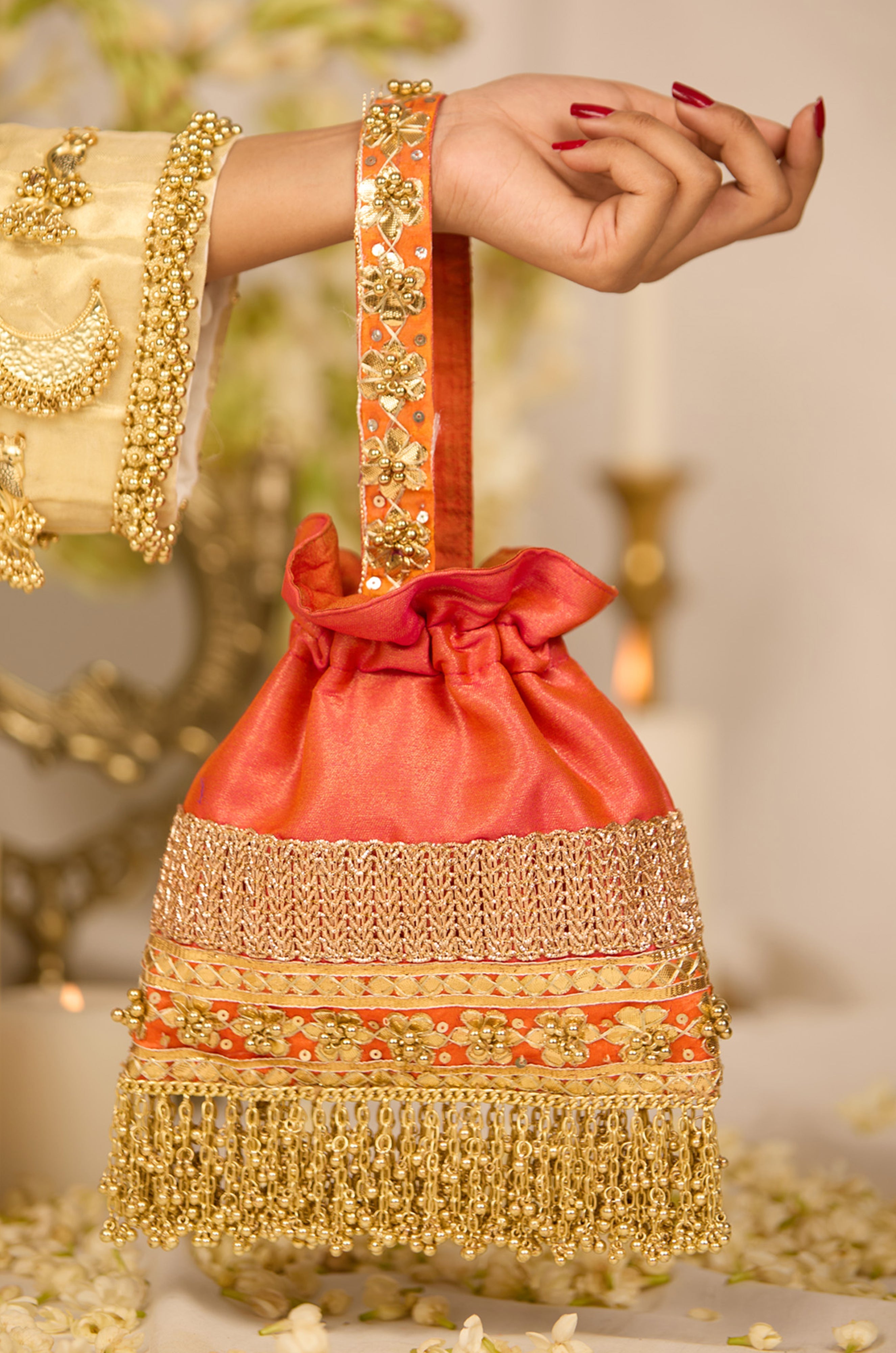 Metallic Gold Jutti & Prisha Orange Potli