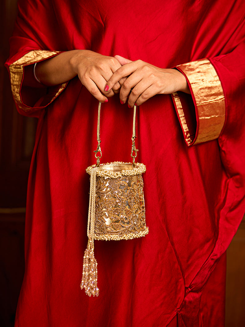 Adhika (Potli)