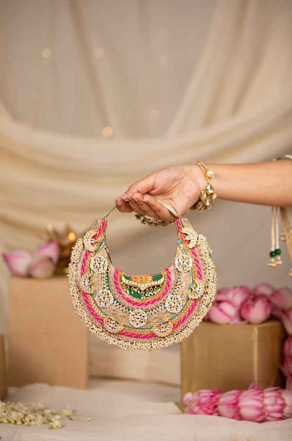 Pranika Gold Handbag