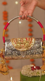 Tanvika Gold Handbag